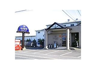 山村歯科クリニック 友江駅 外観青い看板が目印です。の写真